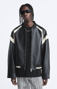 Stylish faux leather jacket showcased on a mannequin.
